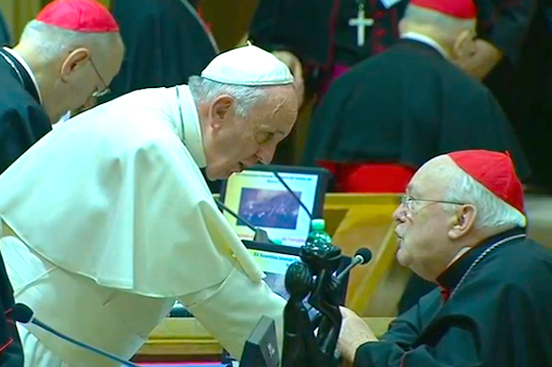 Pope Francis speaks to Cardinal Godfried Daneels during the 2015 Synod.