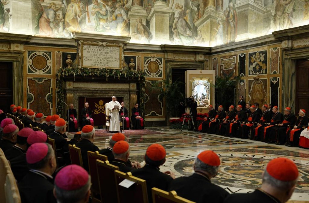 Pope Francis leads an audience to exchange Christmas greetings with members of the Roman Curia in Clementine Hall at the Vatican Dec. 22. (CNS photo/Paul Haring)