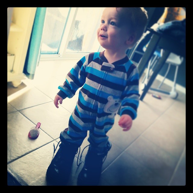 In Daddy's boots.